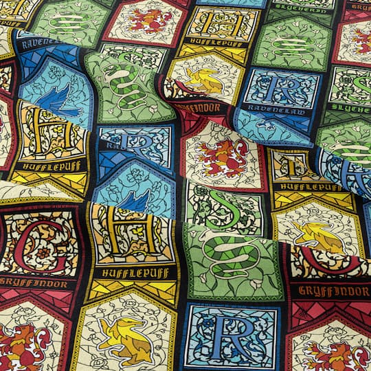 Harry Potter™ Stained Glass Houses Cotton Fabric